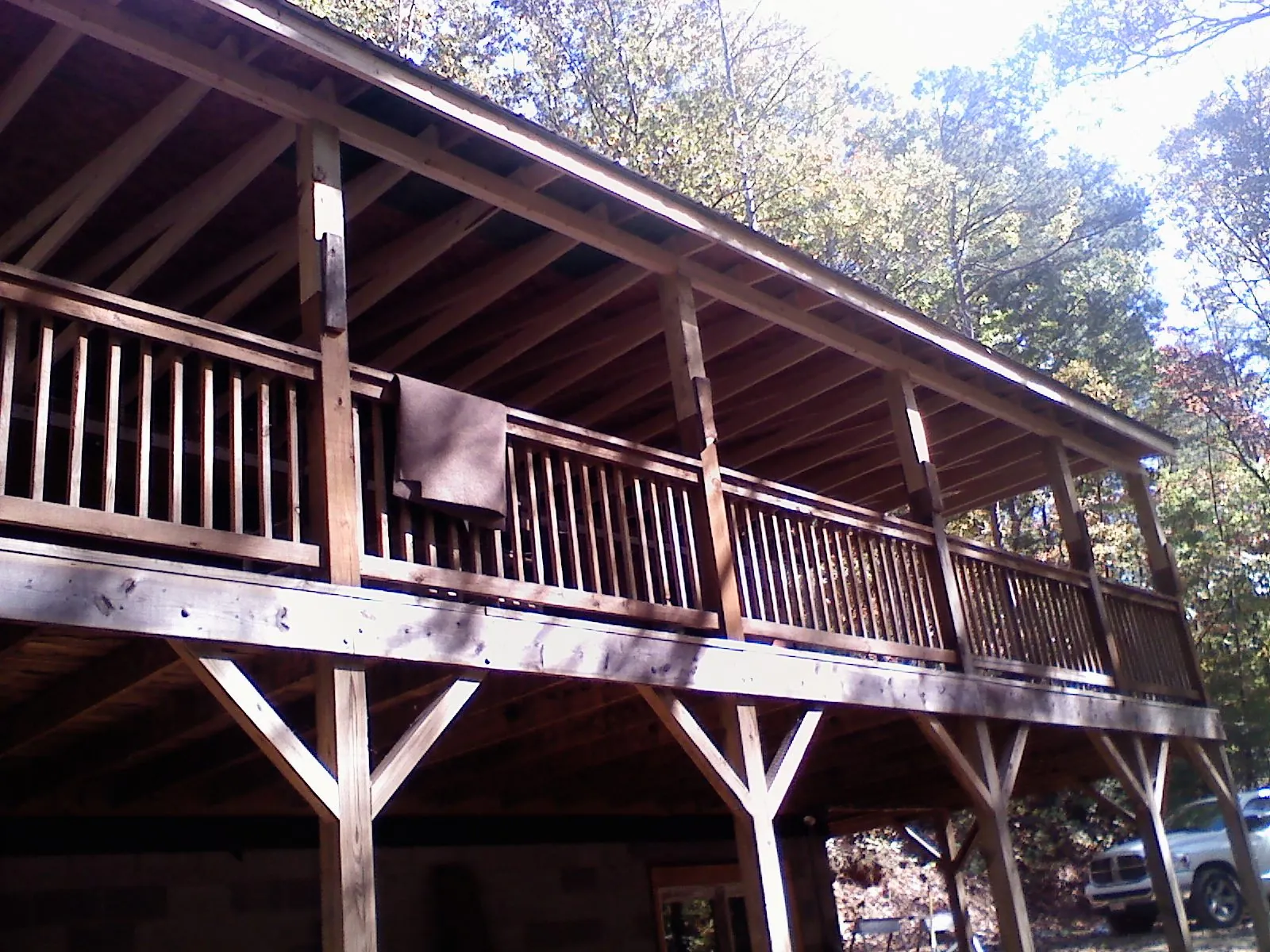 Timber framing under a new elevated porch and deck — Roof Leak Repair in Bellbrook by Roofing Brothers